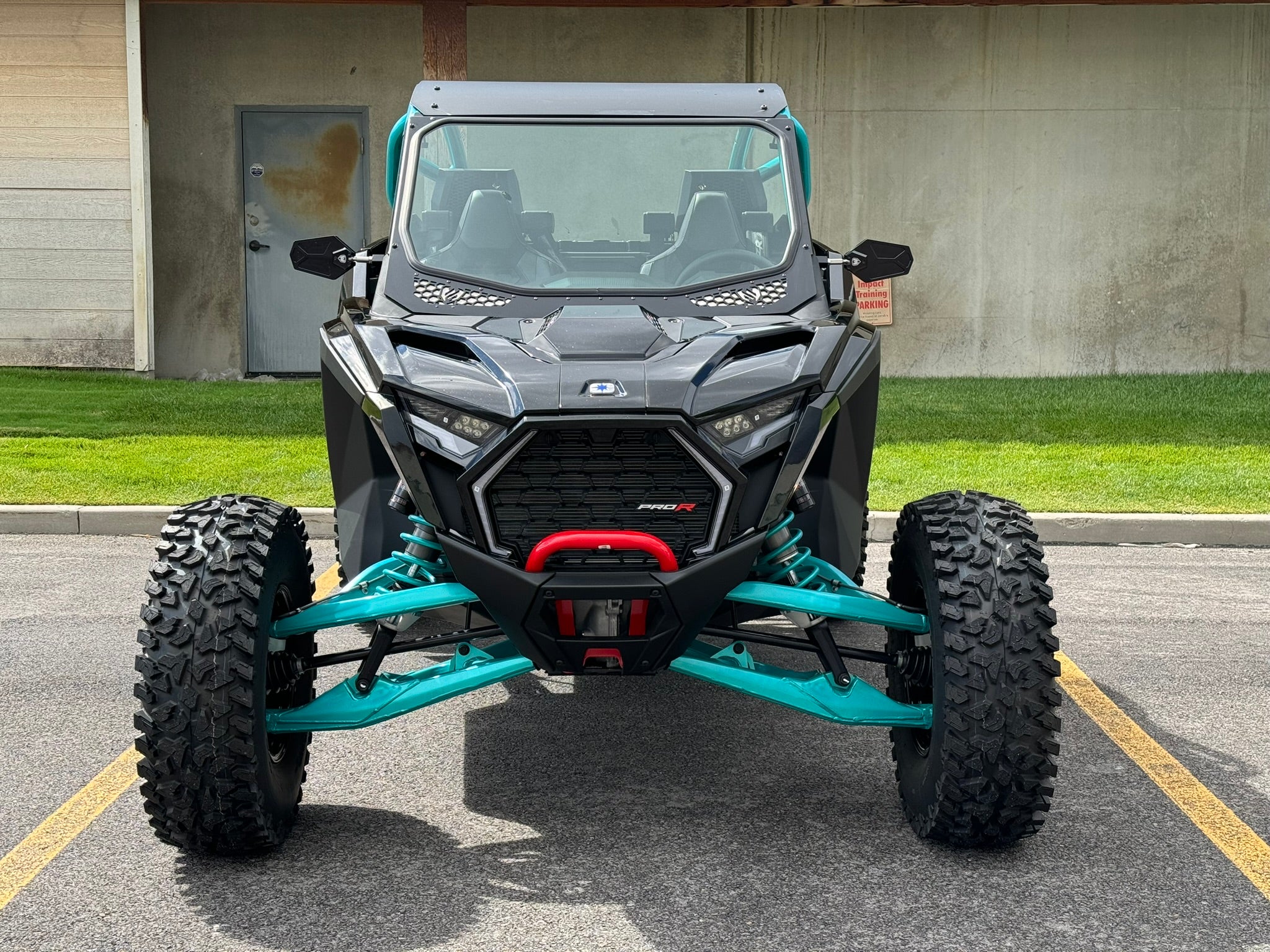 polaris pro r fitted with moto armor full glass windshield view of entire front of the RZR