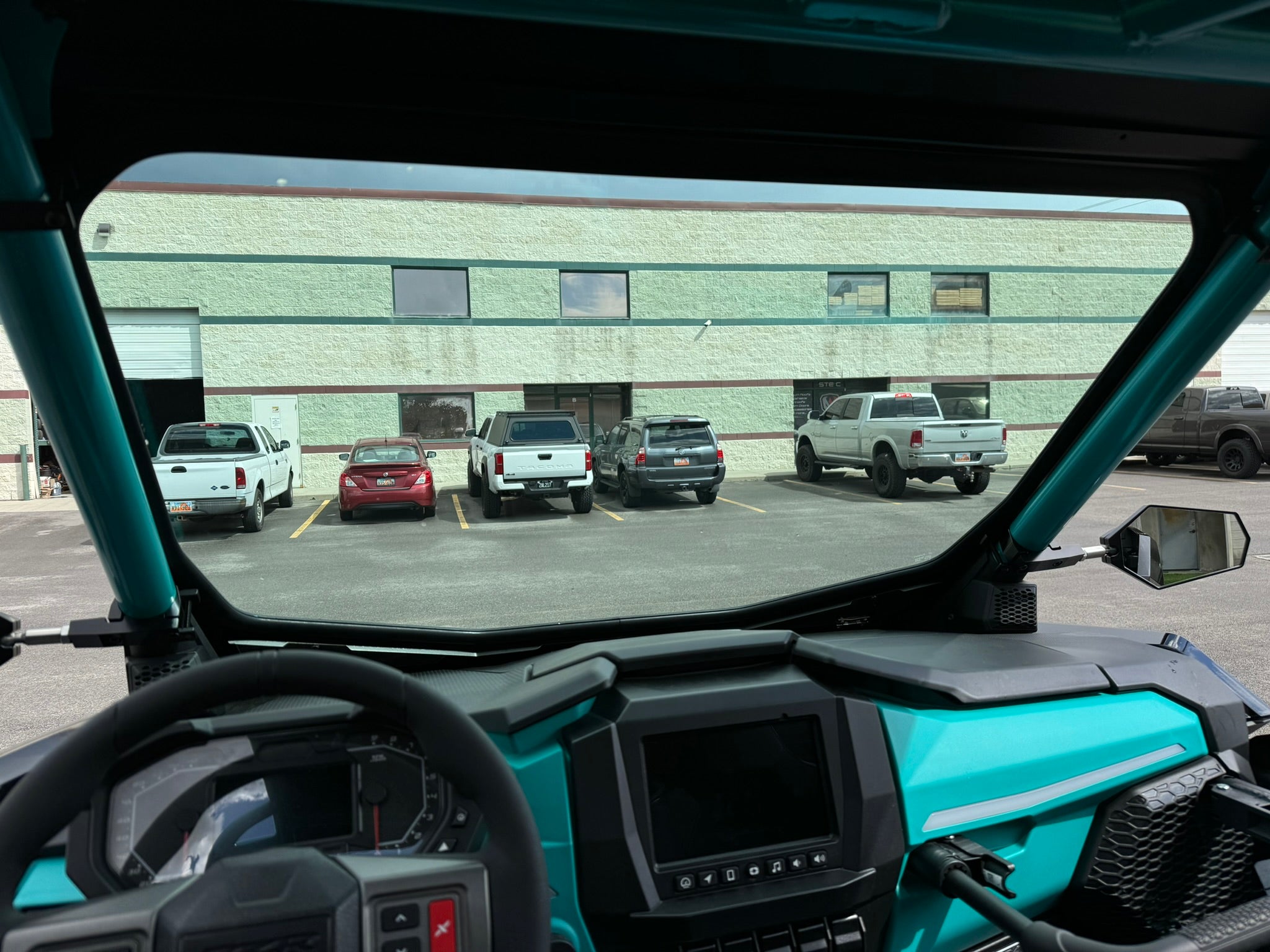 polaris pro r fitted with moto armor full glass windshield view from inside the rzr showing how much visible area there is 