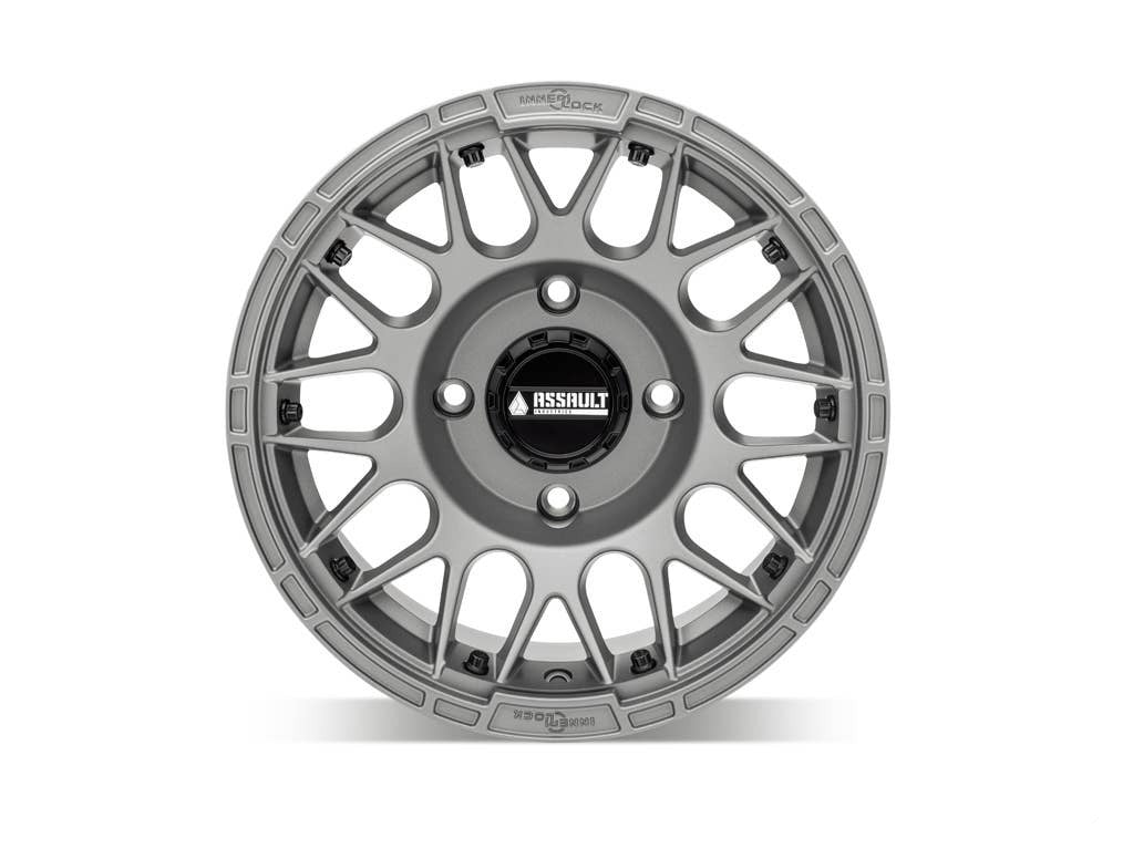 assault utv wheel in titanium gray front shot sitting on white background 