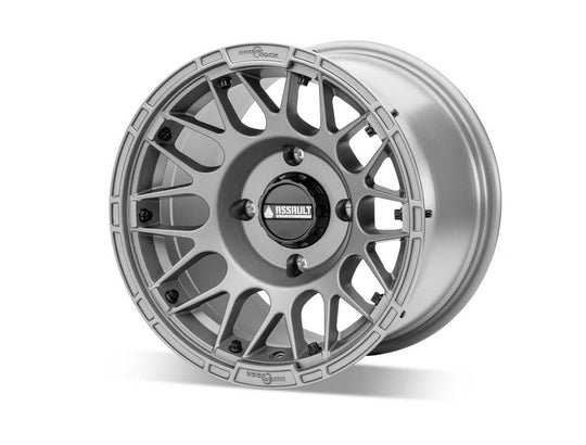 assault utv wheel 10 inch wide in titanium gray sitting on white background 