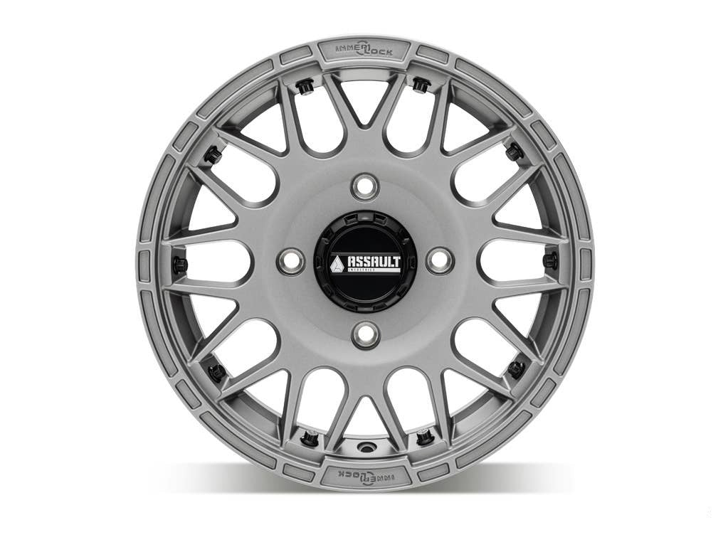 assault utv wheel in titanium gray front shot sitting on white background 