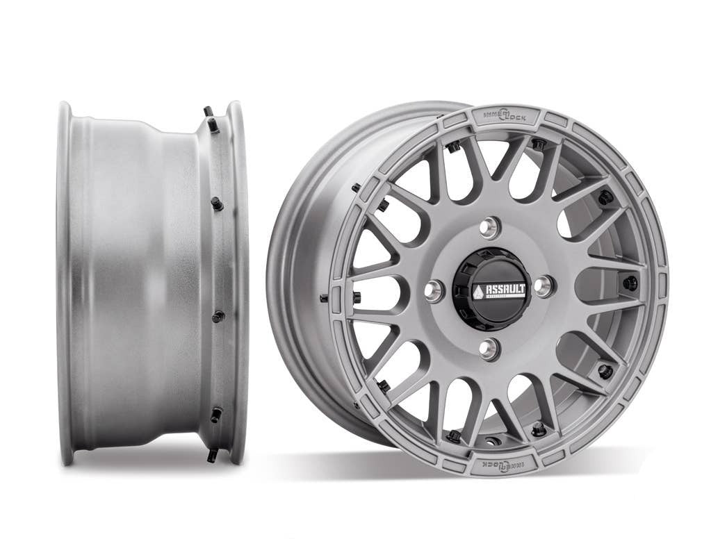 assault utv wheel in titanium gray side shot next to front shot sitting on white background 