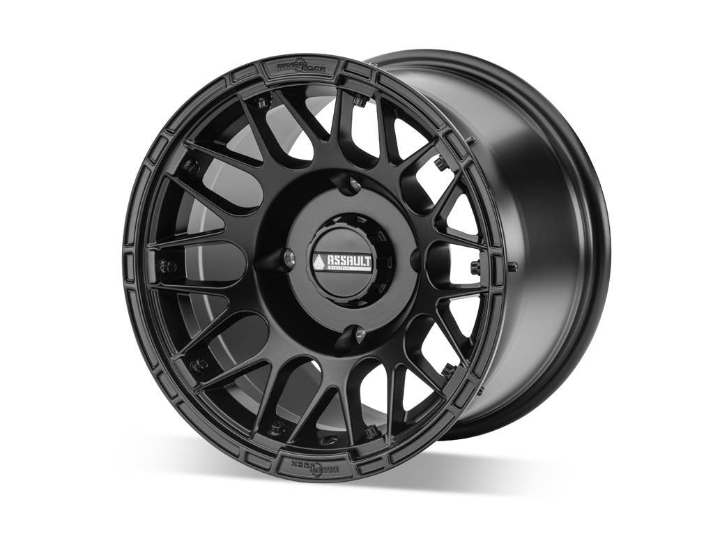 assault utv wheel in black 10 wide wheel sitting on white background 