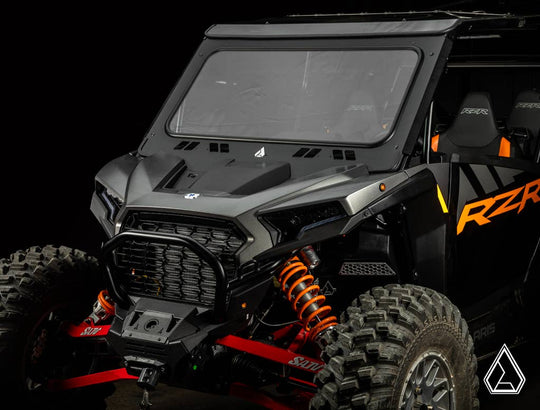 Assault Industries Glass Windshield installed on Polaris RZR XP 1000, featuring clear view and robust black frame.