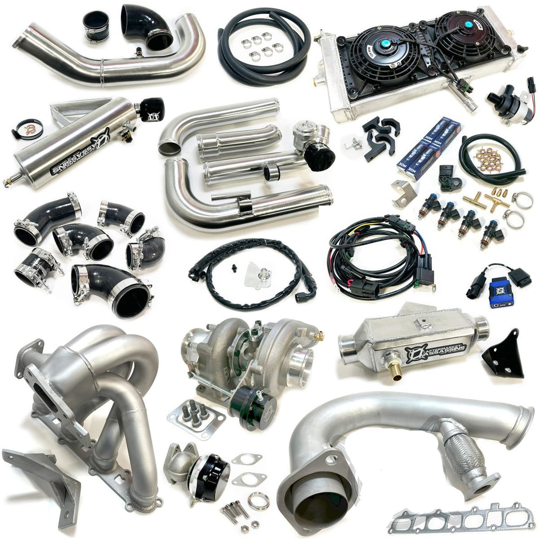 aftermarket assassins complete turbo kit for polaris pro r layed out on white background 