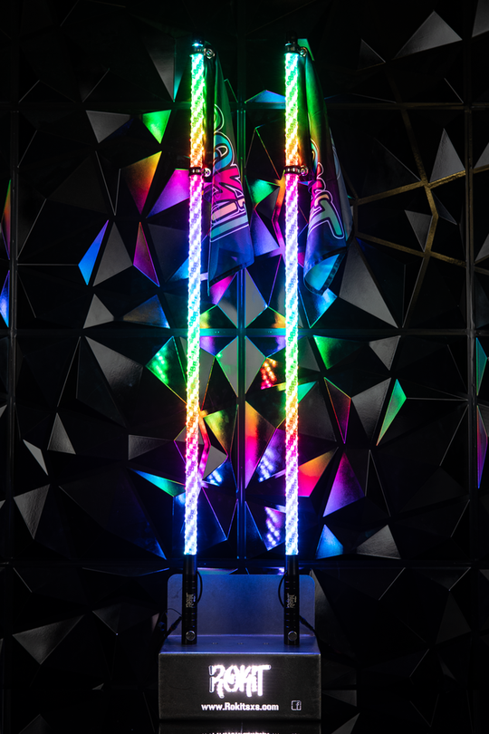 LED WHIPS from rokit in a pair lit up in multiple colors 