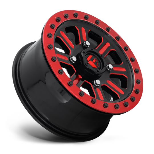 Fuel Hardline Beadlock UTV Wheel In Gloss Black W/ Candy Red Finish sitting at 45 degree angle on white background 