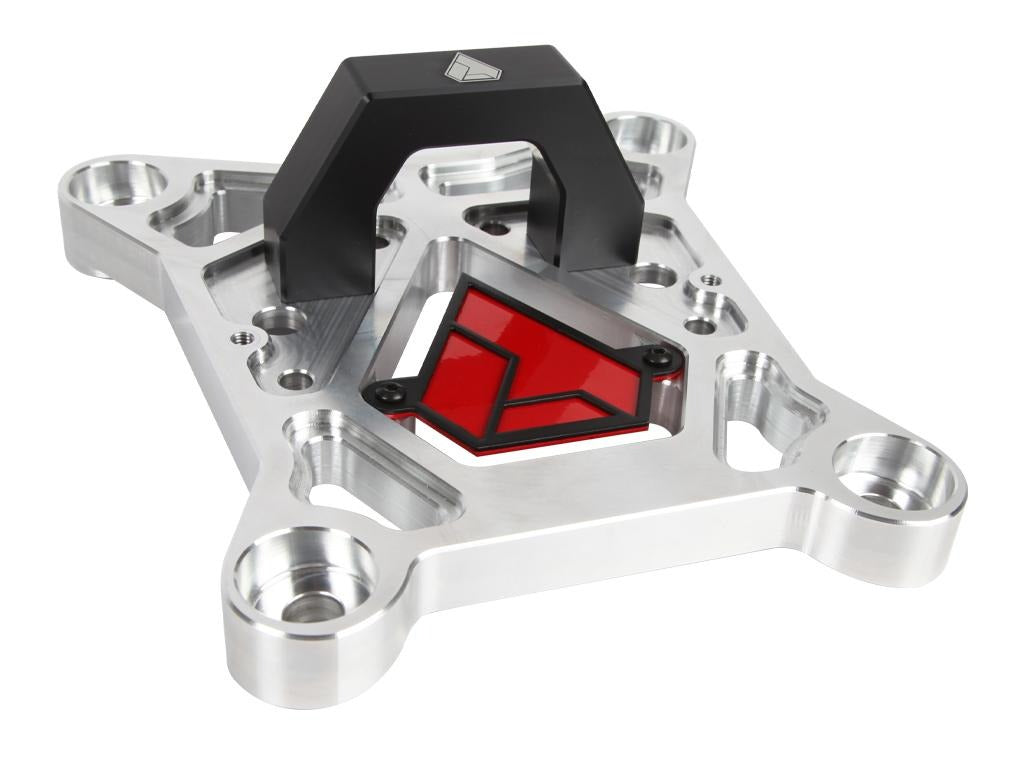 Polished silver billet radius rod reinforcement plate with a matte black tow loop and red inlaid triangular logo, designed for robust support and custom styling on a Polaris RZR Pro XP.