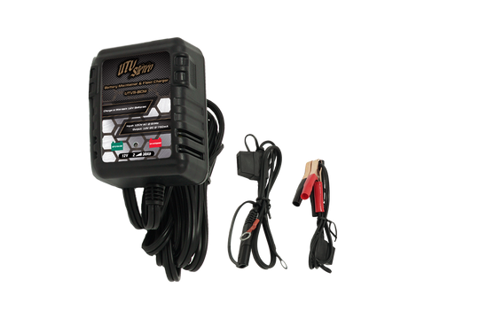 12 volt automatic battery charger from utv stereo on white background